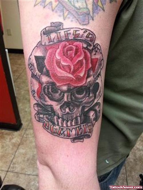 Pink Rose And Grey Ink Skull Gambling Tattoo