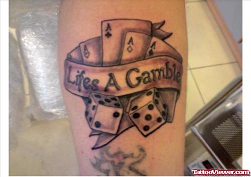 Lifes A Gamble Banner and Dice Tattoo On Arm
