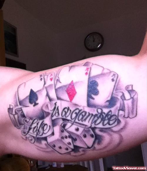 Dice and Cards Gambling Tattoo On Bicep