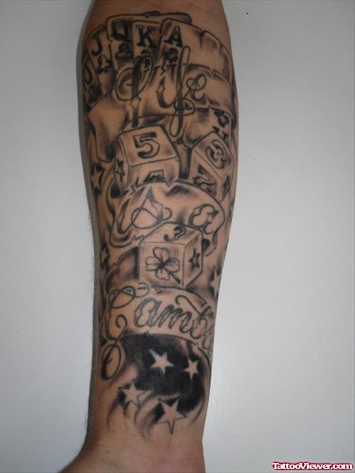 Attractive Grey Ink Dice and Cards Gambling Tattoo On Arm