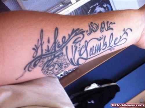 Life Is A Gamble Tattoo On Left Forearm