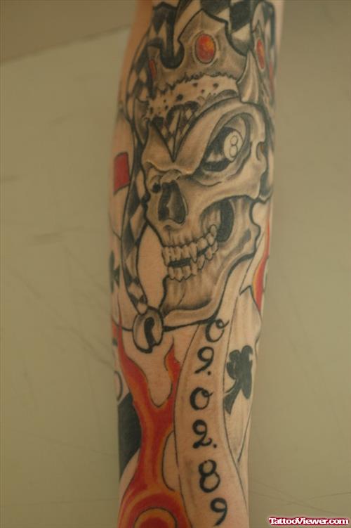 Grey Ink Joker Skull Gambling Tattoo