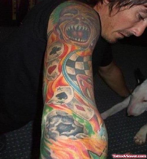 Awesome Colored Gambling Tattoo On Man Right Sleeve