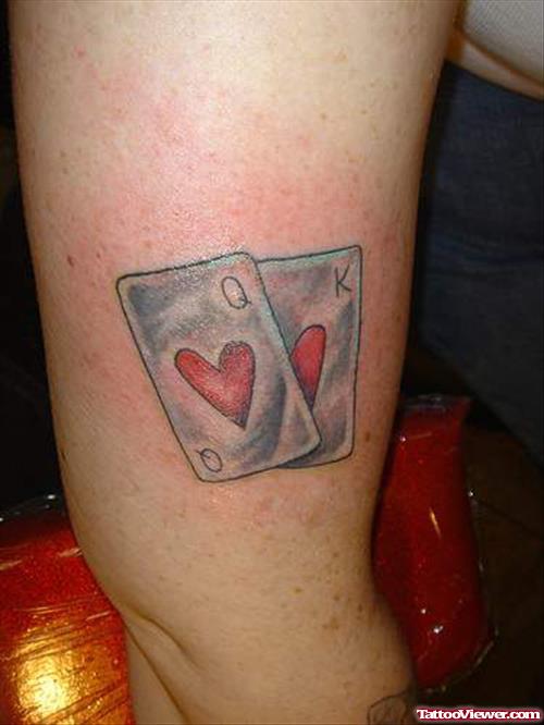 Red Hearts Gambling Cards Tattoo On Sleeve