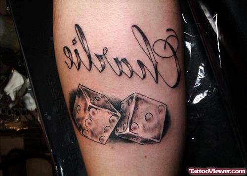 Grey Ink Dice Tattoo On Bicep