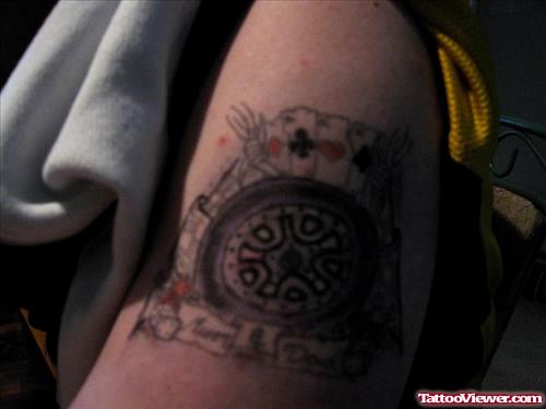 Awesome Grey Ink Gambling Tattoo On Left Bicep