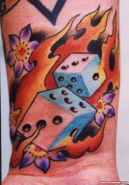 Colored Flaming Dice and Flowers Tattoos On Wrist