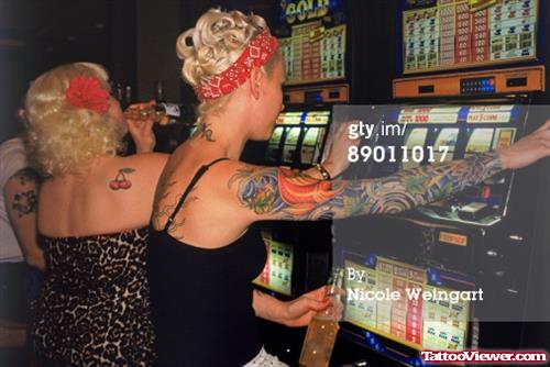 Gambling Tattoo On Girl Right Sleeve