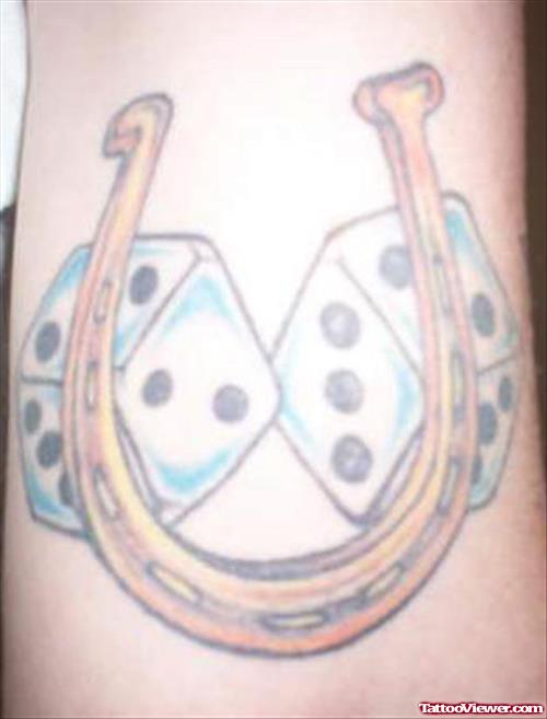 Blue Ink Dice And Horsehsoe Gambling Tattoo