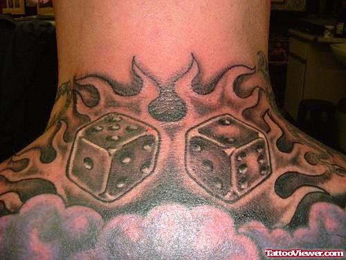 Grey Ink Dice And Gambling Tattoo On Upperback