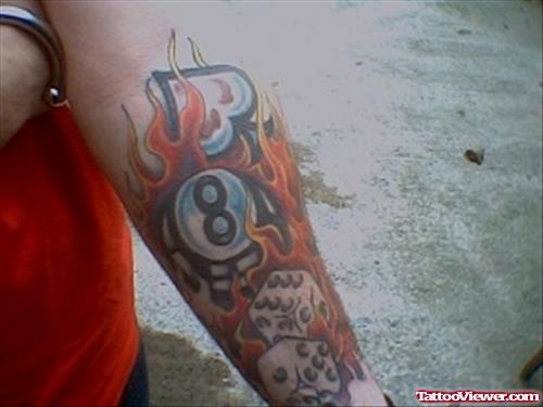 Flaming Eightball Gambling Tattoo On Sleeve