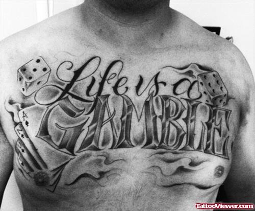 Life Is A Gamble Dice Tattoo On Man Chest