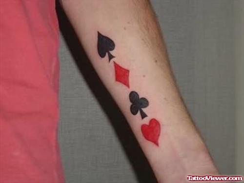 Gambling Cards Symbols Tattoo On Arm