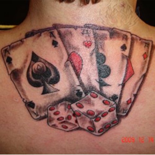 Colored Cards And Dice Gambling Tattoo On Upperback
