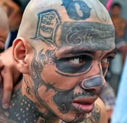 Gangster Tattoo On Face