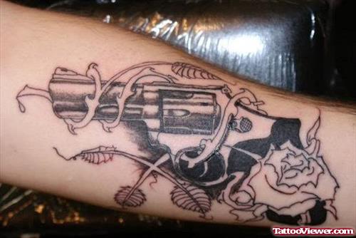 Grey Ink Gun Gangsta Tattoo On Left Forearm
