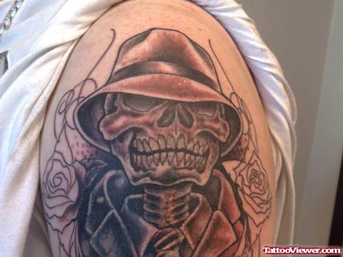 Grey Ink Gangsta Tattoo On Man Left Shoulder