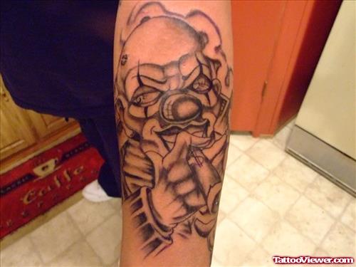 Grey Ink Clown Tattoo On Left Arm