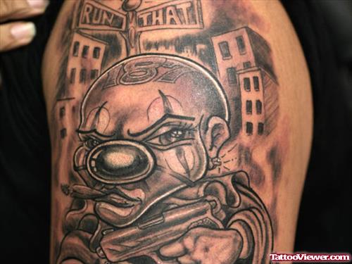 Grey Ink Clown Head Gangsta Tattoo On Left Half Sleeve