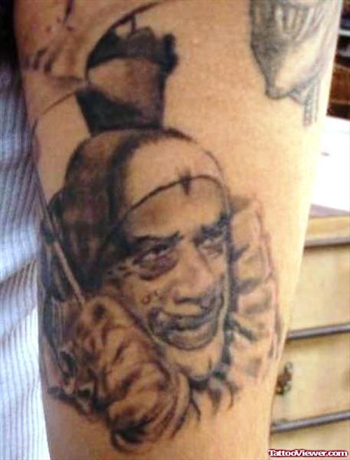 Grey Ink Gangster clown Tattoo