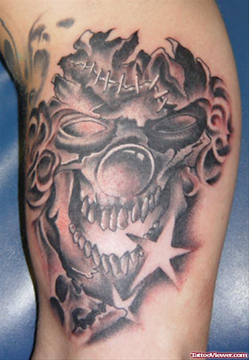 Grey Ink Joker Gangsta Tattoo On Biceps