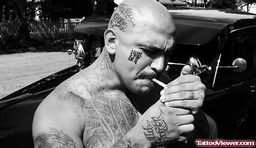 Gangsta Tattoo On Man Face And Head