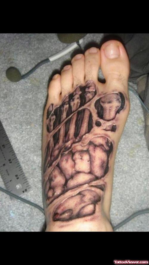 Grey Ink Gangster Tattoo On Left Foot