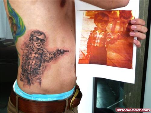 Grey Ink Gangsta Tattoo On Man Rib Side