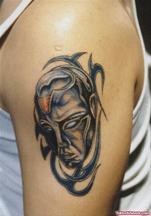 Tribal And Gangsta Head Tattoo On Left Shoulder