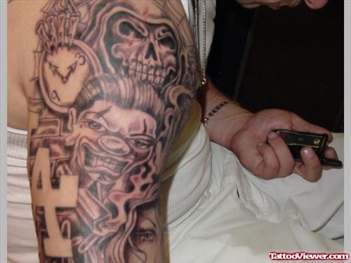 Unique Grey Ink Gangsta Tattoo On Man Right Sleeve