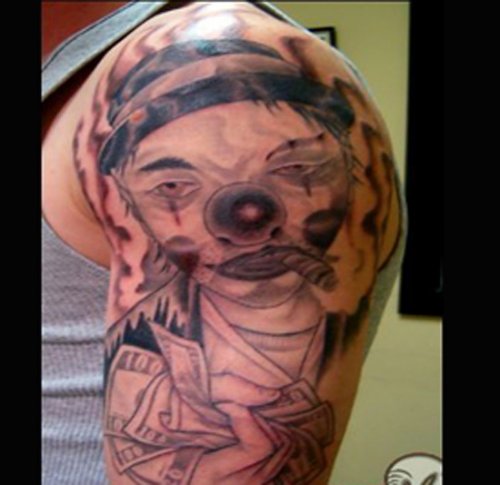 Grey Ink Clown Face Gangsta Tattoo On Left Shoulder