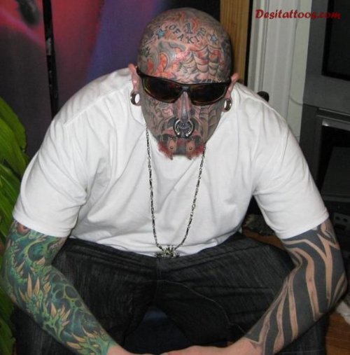 Gangsta Tattoos On Man Both Sleeves