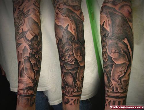 Awesome Grey Ink Gargoyle Tattoo On Sleeve