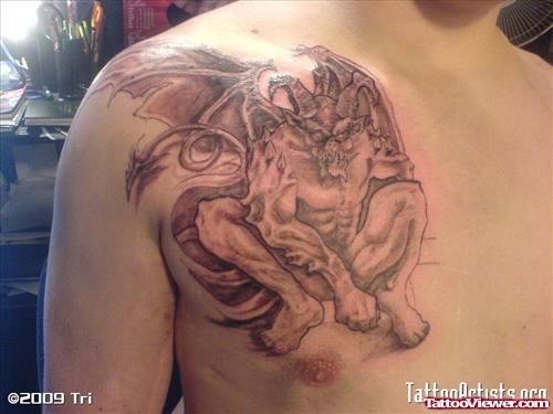 Grey Ink Gargoyle Tattoo On Man Chest
