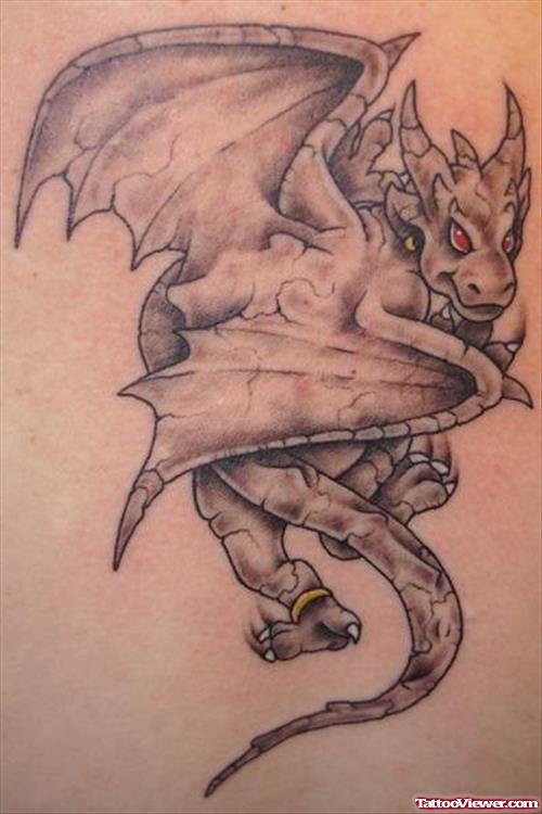 Grey Ink Flying Gargoyle Tattoo