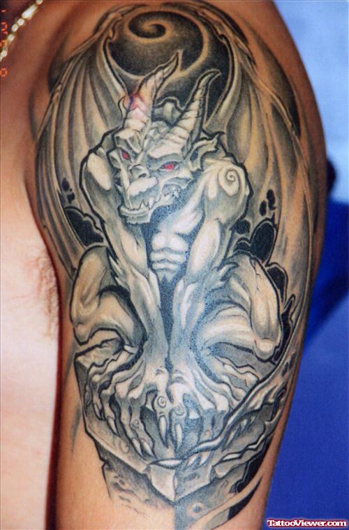 Grey Ink Gargoyle Tattoo With Red Eyes