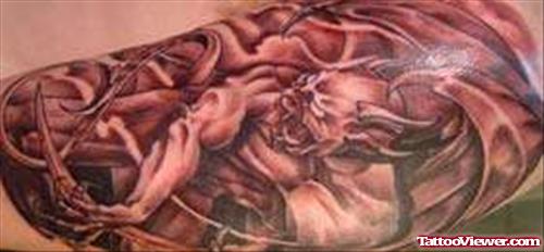 Brown Ink Gargoyle Tattoo