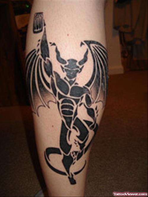 Black Ink Gargoyle Tattoo On Back Leg