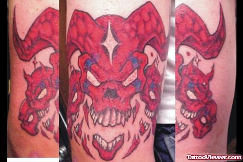 Red Ink Gargoyle Head Tattoo