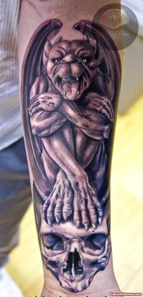 Grey Ink SKull Gargoyle Tattoo On Arm