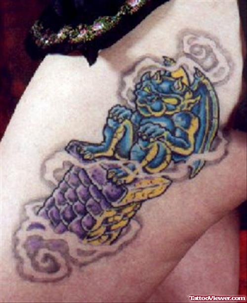 Attractive Blue Ink Gargoyle Tattoo