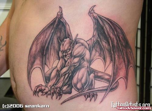 Grey Ink Gargoyle Tattoo On Left Rib Side