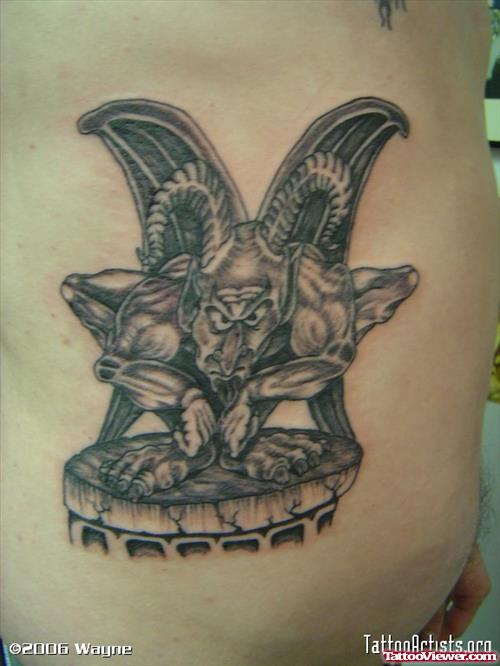 Grey Ink Gargoyle Tattoo On Side