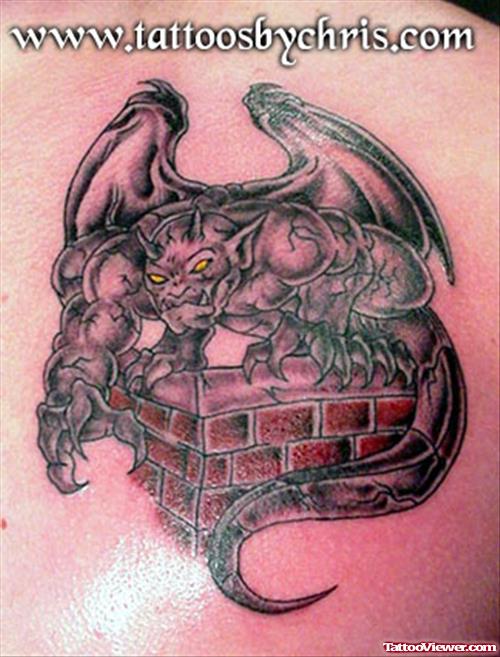 Brick Wall and Grey Ink Gargoyle Tattoo
