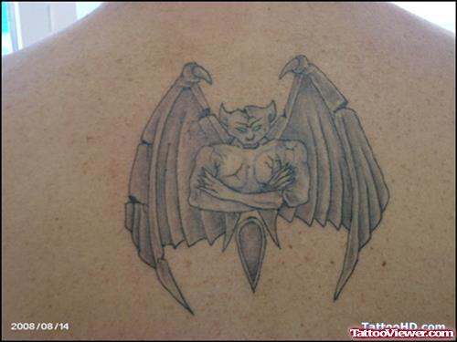 New Grey Ink Gargoyle Tattoo On Upperback