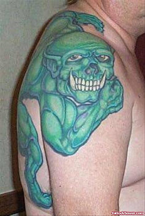 Green Ink Gargoyle Tattoo On Right Shoulder