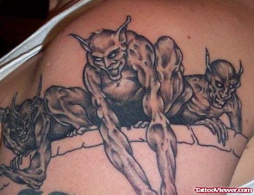 Awesome Grey Ink Gargoyle Tattoos Design