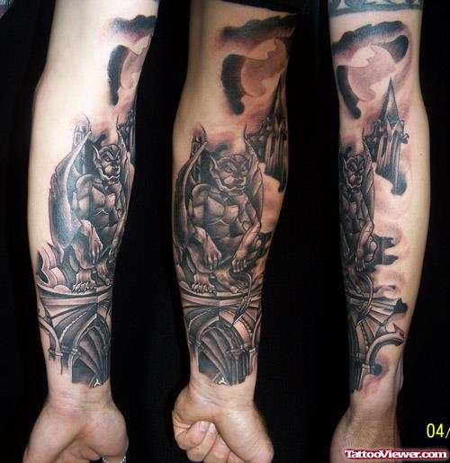 Grey Ink Gargoyle Tattoo On Forearm