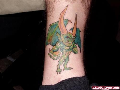 Green Ink Gargoyle Tattoo On Leg