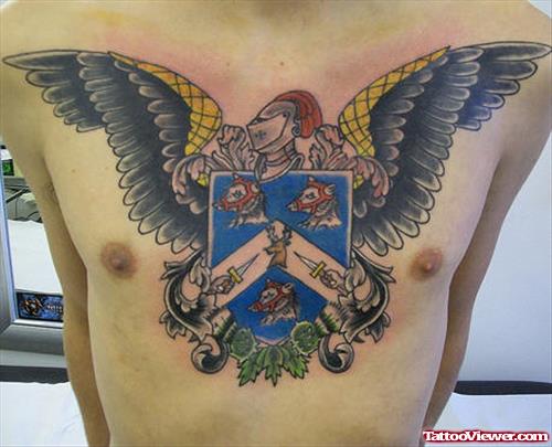Crest And Gargoyle Tattoo On Man Chest